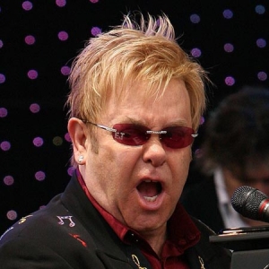 Elton John and his band perform at Holkham Hall